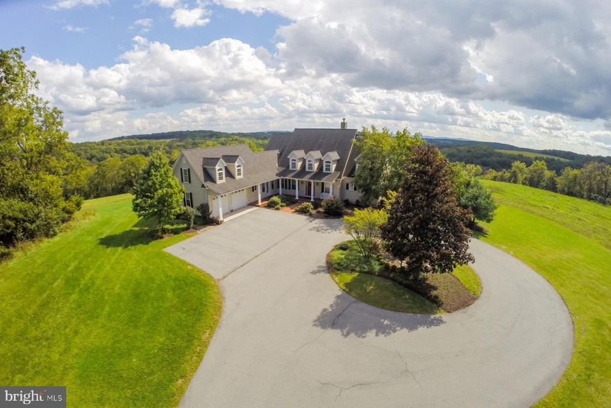 Welcome to Leather Corner Post Farm and Stables.  Privacy and panoramic views abound at this hidden treasure resting on 42 acres in the sought after Parkland School District.  The property offers flexible options for equestrian pursuits, organic farming or perhaps a sophisticated gentleman s estate.  The large open floor plan features lots of natural lighting, Brazilian Cherry floors and a gourmet kitchen, prime for entertaining.   An oversize deck wraps around the home to take in the lush, rolling hills view.  A lovely master bedroom suite is found on the main level.  There are four additional spacious bedrooms, four full baths and three half baths for family and guests.  A home office on the main floor with built in desk and cabinets is available for working remotely. Anchoring the walkout lower level is an indoor swimming pool and a large entertainment room. A nine stall horse barn with heated tack room completes the property with a 100  x 200  lighted riding arena, horse trails throughout the wooded areas and a creek for summer picnics.
