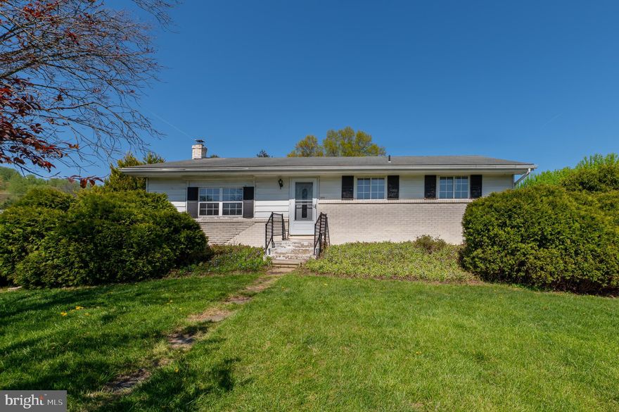 HIGHEST & BEST OFFERS DUE BY NOON ON MONDAY, MAY 5. Enjoy the beautiful setting and views for this East Penn home. Create your vision for this detached corner ranch in a lovely neighborhood. The home has almost 1,200 square feet with three bedrooms and a full bath, all awaiting your décor updates. The living room has bright natural light year-round and contains a cozy pellet stove for colder weather. The kitchen opens to a large dining area with sliding doors to the back deck and yard. The spacious backyard provides outdoor space and privacy for relaxation or entertainment possibilities. A full unfinished basement with an outside entrance allows plenty of space for storage and laundry. The home sits on nearly a half-acre and offers a fantastic opportunity for a new buyer to convert this property into their ideal haven. Easy access to major routes, schools, hospitals, and shopping.