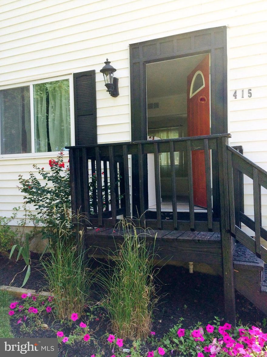 Light, bright and clean two-story home with many upgrades!   Renovated kitchen with newer stainless steel appliances in 2017-2018, granite countertops, newer high efficiency washer and dryer.   Many newer windows.   Updated flooring on the main level.  Marble tile in the bathrooms.  Sliding glass doors from the dining room to the rear deck.  Driveway parking.  The community offers multiple beaches, marinas, Kayak racks, boat ramps and playgrounds!    Blue Ribbon schools.  Convenient commuting location to DC, Baltimore and Ft. Meade.  No Smoking.  Energy star appliances and efficent heat and A/C for low monthly payments.