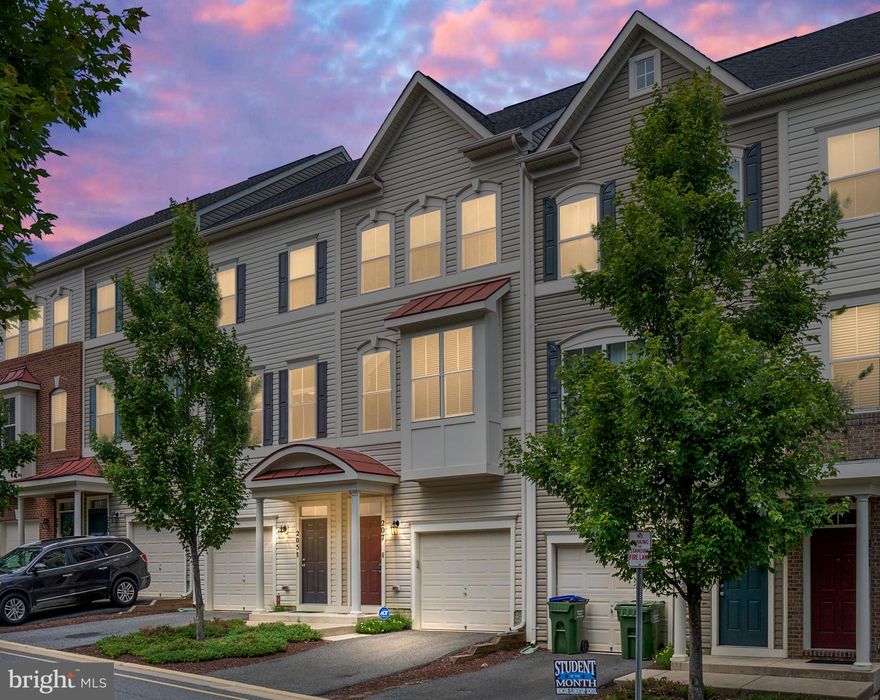 THIS PRISTINE AND CLEAN HOME IS MOVE IN READY**HARDWOOD FLOORING IN ALL THE RIGHT PLACES**OPEN FLOORPLAN**TWO MASTER SUITES**9 FT CEILINGS**SHOWS LIKE A MODEL**BACKS TO TREES**EASY COMMUTE**RIGHT NEAR THE I95 EXIT**WALK TO SHOPPING AND STARBUCKS**(GROUND LEVEL ROOM COULD BE USED FOR 3RD BEDROOM)