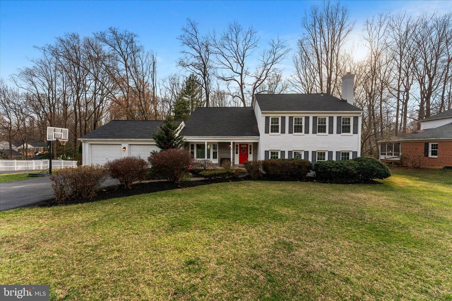 Welcome to 11943 Riders Lane, a beautifully updated 5-bedroom, 3-bathroom home nestled in the highly sought-after Fox Mill Woods neighborhood of Reston, VA. Offering the perfect balance of charm, modern updates, and an unbeatable location, this property invites you to experience comfortable living with unparalleled convenience.

From the moment you arrive, you’ll be captivated by this home’s stately brick exterior, accented by custom shutters and a newer roof (2020). The property sits on a spacious 0.38-acre lot, providing a peaceful retreat with an expansive brick patio—ideal for outdoor entertaining, morning coffee, or simply enjoying the serene surroundings. With a two-car garage and new windows (2021), this home blends classic curb appeal with modern efficiency.

Step inside to discover gleaming hardwood floors bathed in natural light, creating an inviting and warm atmosphere. The thoughtfully designed main level features a stunningly remodeled kitchen (2021) with Quartzite countertops, soft-close cabinetry, and new light fixtures (2025), making meal prep a joy. Adjacent, the formal dining room is perfect for hosting dinner parties or family gatherings.

A cozy family room offers an ideal space for relaxation, featuring a striking wood-burning fireplace with a custom stone mantle and marble surround. The addition of crown molding and a built-in wet bar enhances both comfort and sophistication. This level also includes an extra bedroom or home office with sliding glass doors leading to the private backyard—perfect for those working remotely or in need of flexible living space. A mudroom with ample storage and a spacious laundry room (with space for a full-sized refrigerator) add to the home's practical appeal.

Upstairs, the primary suite is a true sanctuary, offering a spacious sitting area and dressing room. Three additional generously sized bedrooms provide plenty of space for family and guests, with one bedroom offering convenient attic storage access. The recently refreshed bathrooms (2025) add a touch of modern elegance, complemented by updated door and cabinet hardware (2025) for a fresh, stylish look.

One of the many standout features of this home is its location just outside Reston's HOA boundary—meaning no HOA fees or restrictive covenants while still enjoying access to the area's incredible amenities. The home is right around the corner to the Fox Mill Woods Swim & Tennis Club, providing a wonderful opportunity to enjoy community recreation. Best part... there is NO WAITING LIST!

For those who love the outdoors, the home offers immediate access to 55 miles of paved and natural trails winding through 1,350 acres of open space, perfect for walking, biking, and exploring nature. Reston's renowned shopping, dining, and entertainment options are just minutes away, along with top-rated schools and world-class healthcare facilities.

Commuting is a breeze with quick access to the Wiehle Metro Station, Reston Station, and major roadways. Dulles Airport is just 10 minutes away, making travel effortless for frequent flyers.

With recent updates including a new Trane HVAC system (2021), fresh paint throughout, and an exterior refresh (2025), this home is truly move-in ready. Every detail has been carefully considered, making 11943 Riders Lane the perfect blend of comfort, style, and convenience.

Don’t miss your chance to own this remarkable home in one of Reston’s most desirable neighborhoods. Schedule your private showing today and discover everything this stunning property has to offer!