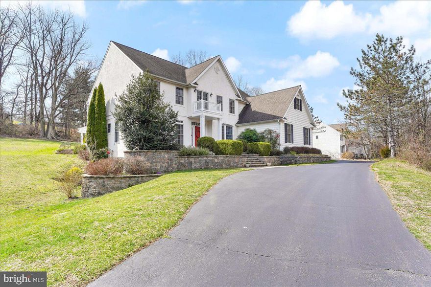 Welcome!  We have no doubts that you will fall in love with this beautiful home located on a cul-de-sac street in the award-winning Garnet Valley School District!  This wonderful home offers everything you have been looking for!  From the moment you walk up the paver steps to the front door and turn to look at the beautiful views in front of you, you will realize this home is special.  The foyer is open with gorgeous Brazilian cherry hardwood floors and lovely crown moulding, and a nice archway greeting you to the rest of the home!  The living room and dining rooms flank the foyer and offer great spaces for entertaining family and friends. And as you walk into the family room you'll love all of the windows overlooking the back deck, patio and yard!  This room has soaring ceiling yet the coziness of the double-sided fireplace adds a special charm to the room.  The fireplace is shared with the kitchen and breakfast room.  Who doesn't love a fireplace in the kitchen!  The kitchen is a chef's delight with the abundance of counter space and cabinetry, stainless steel appliances, double wall ovens and large gas cooktop.  The breakfast room off of the kitchen is a great place for informal family dining.  And in the warm weather, let your evening dinner spill out to the deck and patio to enjoy the wonderful outdoor spaces offered.  If you stay outside on a cool evening, be sure to use the fire pit and extend your time enjoying the fresh air.  Back inside, the main floor office is very big and could also be used as a first-floor bedroom since there is a full bath next to it.  This gives families options if they have an aging parent of somone with special needs.  Lastly, the mudroom/laundry room is quite spacious and has a door to the driveway and 3-car garage.  The second floor has an oversized primary bedroom with the biggest walk-in closet!  And you'll be super spoiled by having a second laundry room in the primary bedroom.  The primary bathroom has a double vanity, large tub and shower stall too!  There are three additional spacious bedrooms with one being en-suite and the other two straddling a full hall bath.  The nook in the hallway is such a cute space for reading or a studying.  As if this wasn't enough... take the stairs to the lower level to find yet another bedroom, full bath, game area, office space and another family room/great room!  The door to anther patio area allows nice lighting into this level of the home.  All of this conveniently located to all major roadways, shopping and local businesses as well as easy access to Philadelphia and Wilmington.  Make your appointment today and get ready to enjoy your new home!