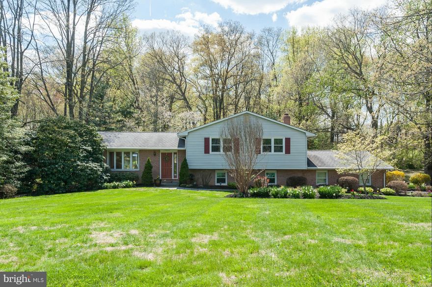 Open 5/3/15 12pm to 2pm.A Beautiful and Spacious Four Level Home in a Wonderful Neighborhood. Hardwood Throughout. Large MBR Addition.L/L FR with Wood Burning FP Perfect for Everyday Living and Entertaining. Enjoy Outdoor Living on the Deck off the DR, by the Pool, or in the Large Screened-in Porch.Two Car Garage.Lovingly Maintained and Tastefully Landscaped.Walking Distance to Carroll Manor Elem.