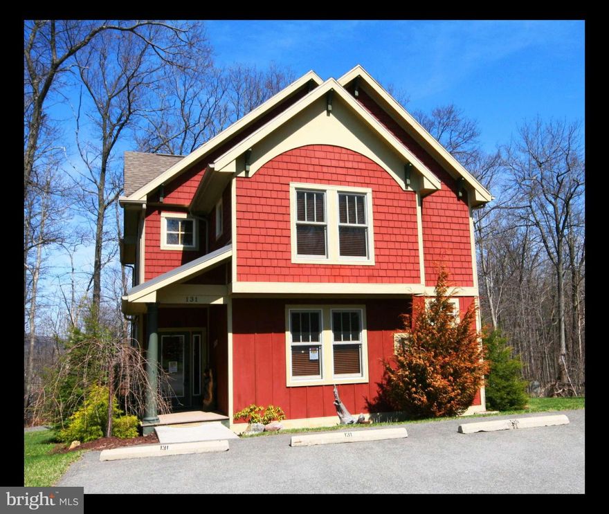 PICTURE PERFECT Craftsman home backs up to trees.  Former SALES MODEL professionally decorated & furnished conveying turn-key w/  Hot Tub. Never rented but ready to convert . One of the few units that has 4 Deeded PARKING SPACES to comply w/ TVRU.  Only Floor Plan in Silver Ridge that has the extra half bath for guests. EXTRAS:  Master BR main level has gas fireplace;  functional Attic storage.