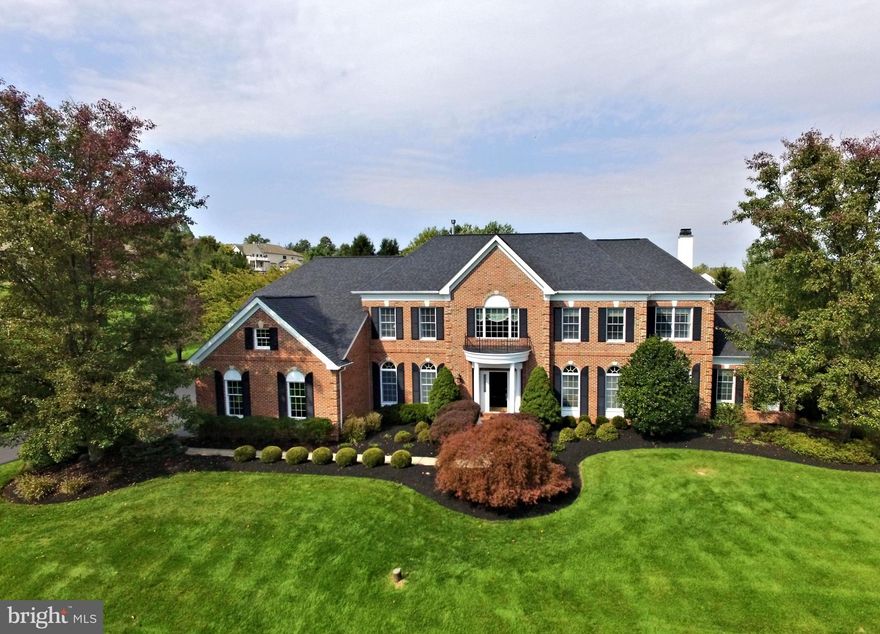 This absolutely stunning, spectacular, expanded classic for the ages brick front colonial in one of Upper Makefield's most prestigious and sought after communities, River Crossing, is now available for purchase. Sited beautifully on an impeccable 1.95 acre parcel, this spacious estate home is replete with high end custom features and finishes both inside and out. The property, set on a higher lot, features updated and gorgeous Kitchen and Primary Bath, 4/5 bedrooms, 4.5 baths, incredible back yard, finished lower level, and over 6,500 square feet of finished space, including TWO well appointed home offices, perfect for these imperfect times. Each spacious room is a seamless blend of neutral color, materials and light, and the property is in immaculate, mint, move - in condition, offered for the first time by its original owners. The soaring two story foyer welcomes you with gorgeous hardwood floors. Immediately you will notice the gleaming, impressive crown moldings and trim throughout. To the left is the elegant formal dining room, with coffered ceiling, wall sconces, transom windows and butler's pantry with Sub Zero beverage center. To the right is the formal living room with transom windows, and French Doors leading to a private office, also featuring transom windows. The spectacular gourmet kitchen features premium appliances such as a Wolf Six Burner Stove/Oven, Wolf Double Wall Oven/Convection Oven, Sub Zero 42" side by side Refrigerator/Freezer, 42" cabinets, tumbled stone backsplash, beautiful granite counters, multi-tiered center island, double sink w/ reverse osmosis tap, nicely sized walk in pantry, and convenient rear staircase. The adjoining two story breakfast room with picture window is the centerpiece of this space, with additional cabinet and serving space, opens to the Sun Room with its cathedral ceiling and walls of windows overlooking the patio and outdoor fireplace and rear yard. The family room, open to the kitchen, is single story with large picture window overlooking the rear yard, and features a wood burning brick surround fireplace with gleaming white mantel. The second home office is beyond the family room, with French doors, large built ins, cathedral ceiling and long distance views. An elegant powder room, mud room entry from the three car garage, and laundry room complete the main floor. The upper level features a bridge overlook to the foyer and breakfast room, luxurious Primary Suite with coffered ceiling, giant walk-in closet, and adjacent sitting room. The Primary Bath with jetted tub, marble floors, his and her vanities, and oversized shower is reminiscent of a high end spa.  Bedroom 2 is price/princess suite, bedrooms 3 and 4 share a large Jack and Jill bath. All bedrooms are bright and airy, with custom walk in closets and recessed lights. The finished lower lever, with impressive trim work, features a large entertainment / theatre / game area with gorgeous built ins, wet bar serving area, flex room perfect for music, exercise, craft or 5th bedroom, as a well appointed full bath is adjacent. The outdoor space features mature trees, privacy, large patio, brick fireplace and more. Multiple zone zone Heat/AC, back up whole house generator, security system, lawn irrigation and many more recent upgrades and capital improvements too numerous to mention  make this one of a kind offering in the Council Rock School District the best buy on the market today. Located in heart of Upper Makefield, just minutes from area parks, New Hope, Newtown, and bridges to New Jersey.***Showings start on Sunday, October 11 at the Open House 11am - 3pm.***
