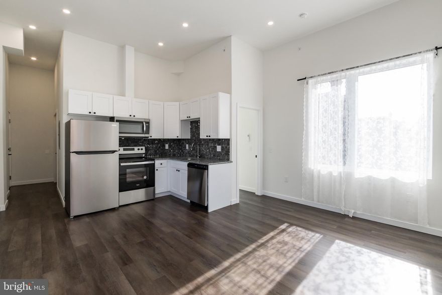 *Available Now!*

Welcome to 5303 Chester Avenue! This new boutique apartment community offers a mix of nine thoughtfully designed one and two-bedroom units. Each residence is meticulously appointed with modern luxury amenities, including stainless steel appliances, vinyl flooring, and in-unit washers & dryers. This 1 bed, 1 bath open layout boasts a living area with tall ceilings and tons of natural light via the large windows. The kitchen is appointed with brand new appliances that include a dishwasher, garbage disposal, microwave, and electric range. Heading into the bedroom you will notice it is comfortably sized with great closet space and tons of natural light from the large floor to ceiling window, while the en-suite bathroom features a spacious tiled shower. Take a step outside to unwind and socialize on the shared front porch or within the enclosed yard, which comes equipped with a barbeque station and fire pit! Free, non-restricted parking is available on adjacent streets granting unparalleled freedom and peace of mind. This building is situated just a few blocks from Baltimore Avenue, allowing residents to enjoy convenient access to various shops, restaurants, and entertainment opportunities. It is also ideally located just a short two miles from the University of Pennsylvania and only one mile from the University of Science! Public transit is also accessible via the Media/Elwyn trolley line, R13 rail trolley, and bus routes 52 & 64 for Septa.

*Pets Permitted; 2 Pets Max, Dogs under 35Ibs, $500 Non-Refundable Pet Fee per pet.