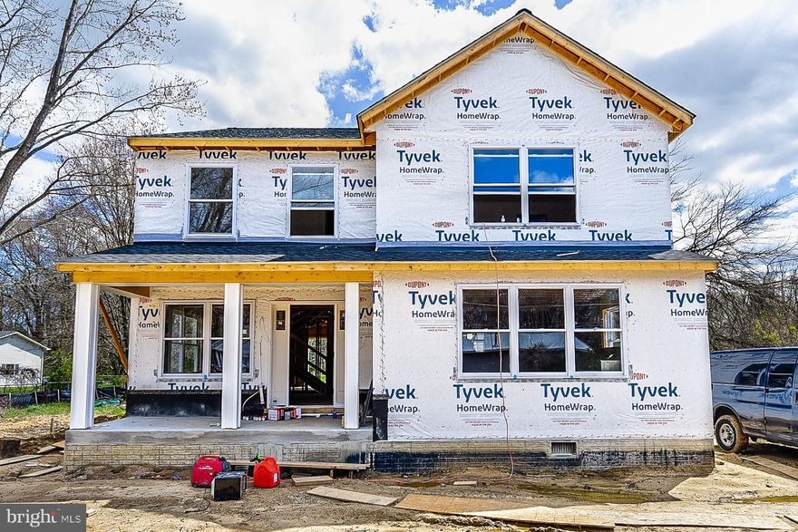 NEWLY CONSTRUCTED HOME IN DESIRABLE BOWLEYS QUARTERS WITH OVER 2,600 SQ. FT. OF LIVING SPACE - DELIVERY IN 60 DAYS!  Still time for buyer to pick some finishes!  Features include 4 bedrooms, 2.5 baths, hardwood floors throughout the main level, a spacious living room, designer kitchen with granite counters & ss appliances, Primary bedroom suite with a walk-in closet & spa bath with a soaking tub & separate shower, rear deck, overlooking the rear yard with storage shed, detached 2 car garage and plenty of off street parking!  Buyer to pay all transfer and recordation taxes.  Interior pictures are of a different renovation from the same builder.