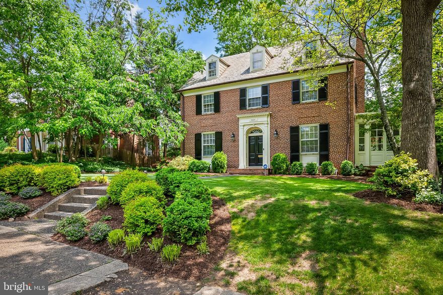 AND NOW WITH A 40K PRICE DROP…Timeless Elegance in Guilford – Classic All-Brick Colonial. Step into this beautifully maintained five bedroom, three and a half bath Colonial home nestled in the heart of Guilford. This all-brick gem exudes historic charm with an abundance of original details, complemented by thoughtful modern updates. From the moment you arrive, the lush, manicured landscaping sets the tone for what lies ahead. Enter through stunning wooden double doors into a welcoming vestibule that opens to a grand foyer, highlighted by a dramatic curved staircase and ceilings over 9 feet tall. The main level features gleaming refinished hardwood floors throughout. A spacious living room offers a cozy gas fireplace and opens via French doors to a sun-drenched spacious  sunroom, complete with walls of windows and access from another set of French doors to a fully fenced backyard — perfect for relaxing or entertaining.  In addition to the spacious sunroom one can enjoy the cozy den/office on the first floor that currently is used as a bedroom for less mobile friends. The formal dining room, framed by a charming bay window with original glass panes, overlooks a picturesque stone pathway. Adjacent is the lovely  kitchen — a chef’s dream! It boasts a F. Bertazzoni (Italia) five-burner gas stove, stainless steel hood with a powerful five-speed exhaust fan, soapstone countertops, a marble-topped island, panel-ready refrigerator, subway tile backsplash, and custom cabinetry with brass hardware and a brass faucet. Decorative glass-front cabinets and stylish tile flooring complete the look. The first floor powder room is off the centre hallway and the back stairway provides direct kitchen access. Upstairs, you'll find five generously sized bedrooms and three full baths, providing ample space for family and guests. The basement adds functionality with a large pantry, abundant storage, French drains, two sump pumps, a vapor barrier, a recently replaced water main, and a new boiler for peace of mind. There is no water trouble here! This lovingly preserved home offers the perfect blend of historic character and modern convenience in one of Baltimore’s most desirable neighborhoods. Don’t miss your chance to experience its special charm — schedule your visit today!