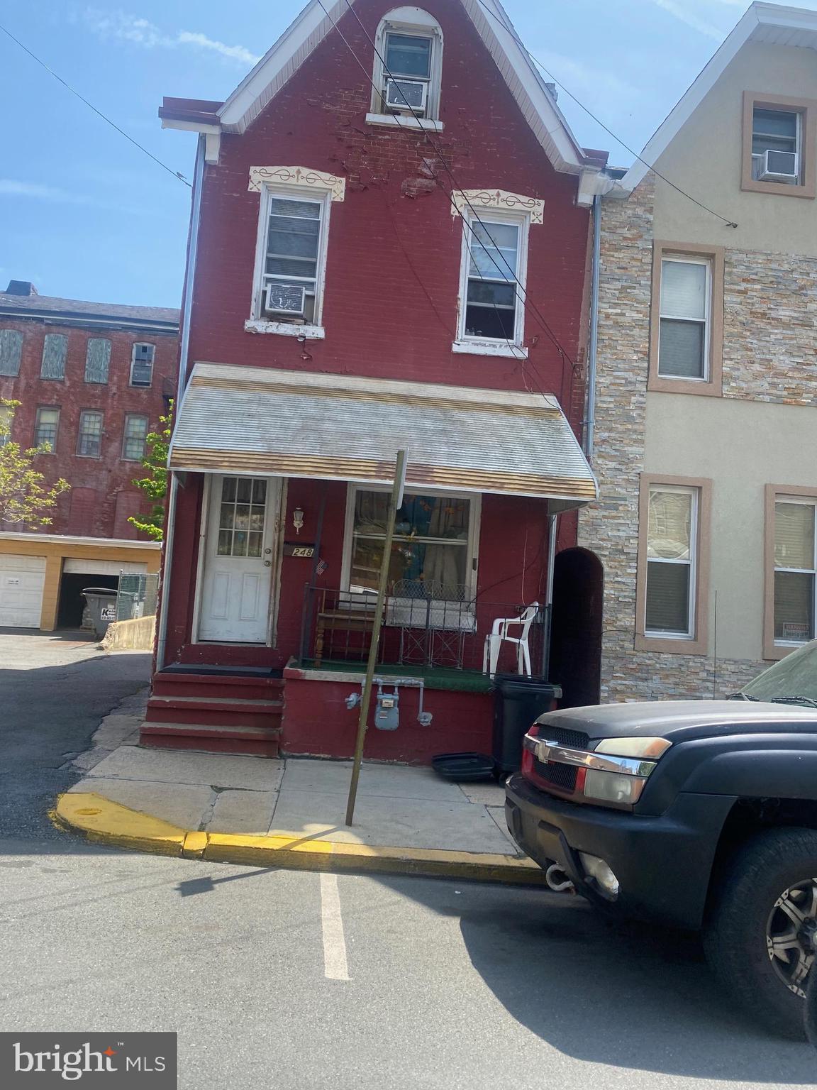 What a lovely place to start! Don't miss your opportunity to own this end of row property with so much potential. This is priced to sell!