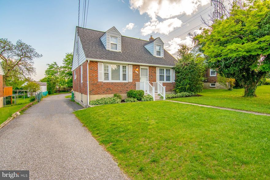 Charming 4 bedroom cape code boasting updates throughout! Updated kitchen leads out to deck and full backyard, perfect to enjoy this summer! Tons of parking in driveway and rear. Fully renovated bathroom and new roof in 2019. Spacious basement with bar perfect for entertaining. A true must see!