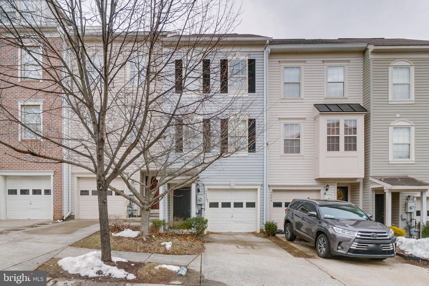 Beautiful well kept Townhome home in Owings Mills New town! Upper level mater suite with  2 bedrooms and laundry on the 3rd level.  Cozy 2nd level with Kitchen 1/2 bath and living area and access to deck. Main level with cozy open lounge area/family room great for entertaining. Wood floors throughout the home! All the luxuries of this great comfortable community.