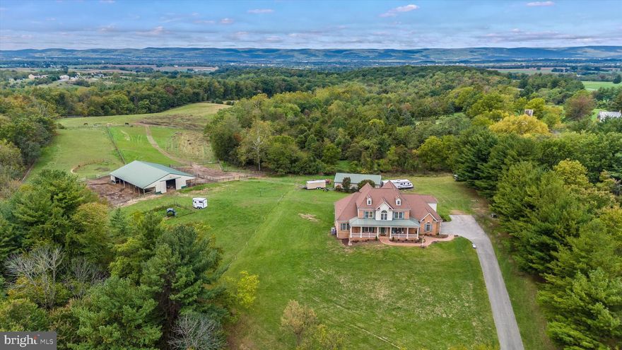 Lovely horse property.  Beautiful custom built all brick large estate home. 4/5 bedrooms, 4 full baths, first floor master trey ceiling master bath shower and jetted tub.  Office with french doors, fully equipped kitchen natural cherry cabinets, open family room, Formal dining with butler pantry. mud room with washer dryer hook ups. 2 staircases. Upstairs 3 bedrooms 2 baths large bonus/ play room. Full unfinished basement, partially studded and rough in bath.
Horse barn 7 -12x12 stalls 6 - 6x12  stalls. Board fence around barn and front paddocks.  18 open fenced acres, 5 wooded acres. 36x48 machine shed. Water and electric to barn and machine shed. Outside barn and drone photos will be taken on Saturday and uploaded Sunday. The property is occupied and an appointment must be made to show, dogs on the property need to be contained.