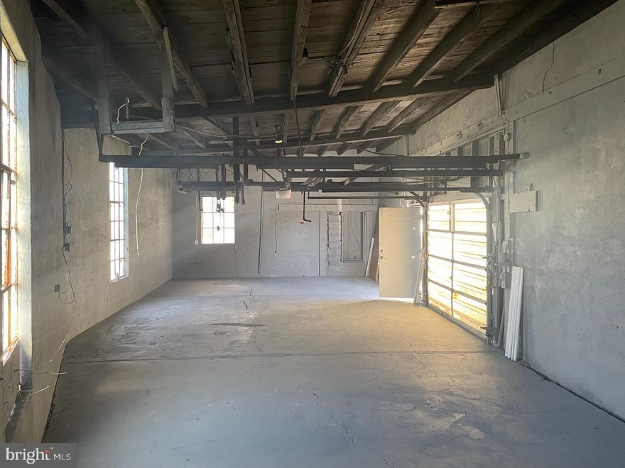 Do You need a spacious garage in a convenient location? Look no further! This 900 square foot garage in the heart of Williamstown is available for rent. With plenty of room for storage, parking or workspace, this garage is perfect for those in need of a little extra room or storage. The garage is equipped with a large garage door, making it easy to bring in and store your vehicles and equipment. Located on a quiet residential street, you'll have peace of mind knowing your materials are secure. The garage is also centrally located to all major highways, making it easy to access from anywhere in the area.