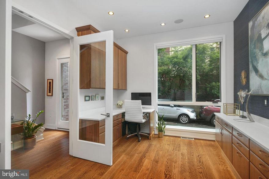 Introducing 1243 Kater Street, a luxurious townhome at Bedford Place located on a quite tree lined street in the heart of Bella Vista.  This new construction home is in pristine condition.  Boasting 4 large bedrooms, 4 full bathrooms, 3 powder rooms and a 6 stop elevator. Enter the home to a serene vestibule, with an office/bedroom/den with adjoining full bathroom on this floor and access to the oversized 2-car garage.  The elevator can be accessed on this floor via the garage or the hallway.  Second floor is an open floorplan with cooks kitchen with oversized quartz countertop, cozy sunken living room with gas fireplace and half bath.  The chef s kitchen has a luxury appliance package including Wolf and Thermador. Off the kitchen is an open dining room with an enclosed balcony.  Third floor hosts two large bedrooms (one with a private deck!), each with marble appointed full bathrooms and oversized closets.  A laundry room with side by side full sized washer and dryer and storage is also on this floor in addition to a large hall walk in closet.  Head up to the 4th floor where you will find the master suite   a mini oasis to relax and unwind.  There is an oversized walk in closet and a spa like bath appointed with luxury amenities including double vanities, free standing soaking tub, open shower and private water closet. Enjoy the outdoors from the spectacular roof deck which is outfitted with a kitchen, 6 person hot tub and breathtaking, panoramic views of Philadelphia! The finished basement is currently one large room with heated tile floors, a wet bar, several storage closets, and a half bath (plumbing in place for a full bath).   The home also comes with an approved tax abatement with 7 years remaining on it.  Floor plans available upon request.