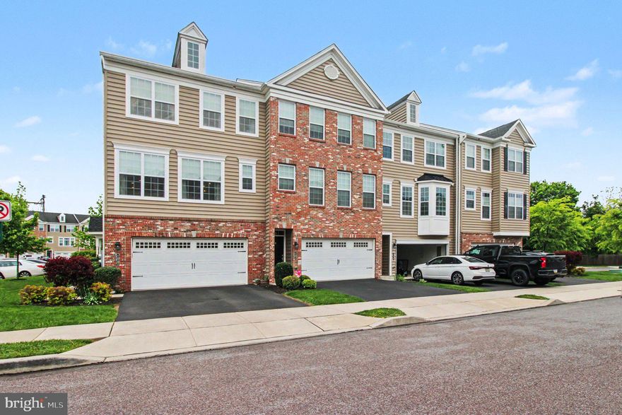 Welcome to this wonderful end unit townhome that features 3 bedrooms, two and a half baths and a two car garage. When you enter the lower level you will find a greeting foyer that leads to the family room with a sliding door to a concrete patio, huge closet and access to the utility room and the garage.  Moving up to the main level you will be presented with a sun lit living room with a gas fireplace, a large kitchen with abundant counterspace, a new microwave oven and dishwasher, center island and a breakfast bar with seating for three. Just off the kitchen is a large dining area with sliders to a nice sized deck. This level is also where the powder room is located. The upper level features the main bedroom with a full bath that features a double bowl sink and a walk in shower. There is also a walk in closet. This level also features a full hall bath, 2 additional bedrooms and a convenient laundry room. Enjoy this end unit that boasts plenty of natural light,  2 car driveway parking and plenty of additional parking for guests. Make your appointment today.