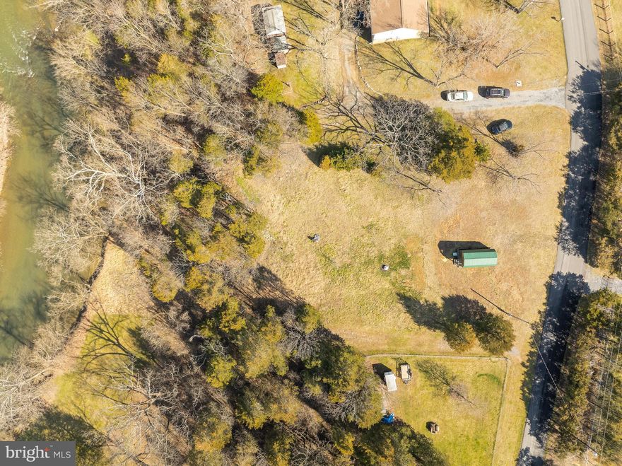 ***Multiple Offers - Highest & Best Due by 2pm on Monday 3/11/24***

Welcome to your slice of paradise on the Opequon Creek! This stunning 1.04 +/- acre lot in Kearneysville, WV offers a unique opportunity for those seeking serenity and adventure. With 130 feet +/- of prime Creek frontage, this property is a water enthusiast's dream.

Imagine waking up to the soothing sounds of flowing water, stepping out onto your own private oasis, and embarking on a day filled with kayaking, tubing, or fishing right from your doorstep. Whether you're simply seeking relaxation on the water, the Opequon Creek provides an exceptional experience.

Nestled amidst the natural beauty of West Virginia, this lot boasts electric on-site and includes a small shed, perfect for storing your outdoor gear or creating a cozy retreat. Currently utilized for recreational purposes, this parcel offers endless potential for customization to suit your desires.

Buyer due diligence is encouraged to explore the possibilities this land presents, whether you envision building your dream home overlooking the tranquil waters or creating a charming getaway destination.

Don't miss out on this rare opportunity to own your own piece of paradise along the Opequon Creek. Schedule your showing today and start living the waterfront lifestyle you've always dreamed of!
