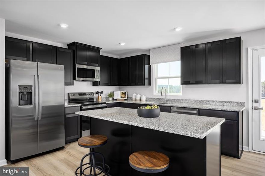 “IMMEDIATE MOVE-IN –  NEW CONSTRUCTION -Cedar by Ryan Homes. Please call to learn more about current incentives and closing cost assistance" The Cedar single-family home offers the perfect blend of function and elegance. A welcoming foyer leads into a spacious great room that flows seamlessly into the gourmet kitchen with a large island and adjoining dining area. A nearby hallway connects to a powder room and a versatile flex space—ideal for a home office, hobby room, or play area. Upstairs, three of the four bedrooms feature walk-in closets, while the luxurious owner’s suite includes generous living space, a massive walk-in closet, and a double vanity bath. The Cedar is a must-see! Other floorplans and homesites are available. Photos are representative.”