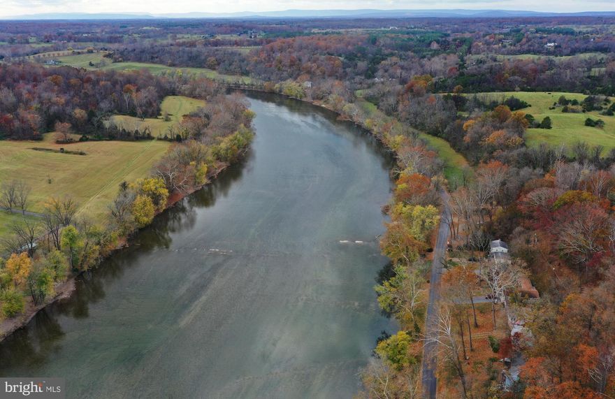 OH SHENANDOAH! RARE RIVERFRONT RECREATIONAL LOT WITH A MAJESTIC STONE CHIMNEY.  
Half an acre along the Shenandoah River, just down the road from well-known Watermelon Park. Convenient to Rt. 7 and Berryville. Park your RV on this beautiful camping lot any time you can get away. Enjoy spectacular water views and your own direct river access.  Fish, swim, tube, canoe or kayak to your heart's content. Build a fire in the recently repointed chimney and grill while enjoying the ambiance of a campfire. Electric service is at the lot for your RV.  Approximately .5 of an acre with about 76 feet of river frontage. The land between the road and the river is part of this lot. The use of this land is for camping and recreational purposes only. It is not buildable (septic not possible). Lot size, water frontage are approximate.