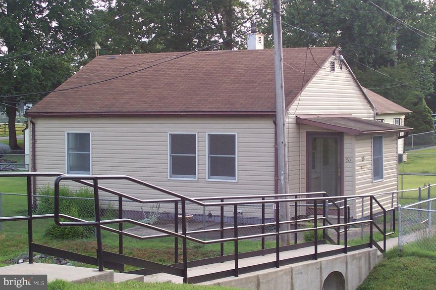 Very well maintained and clean!! Move in ready single unit. 2 Bedrooms and one full bath. Great views from the property as only two sides have houses around. Kitchen has table space. Newer washer and dryer convey. Built in microwave. Enclosed entranceway. Parking very close to house also. Close to playground and the pool. Buyer must pick up buyers packet from the Potomac Heights office.  Must use approved lender and settlement company. Info is in the buyers packet as well as membership application. Seller requests buyers have membership approval before submitting an offer.