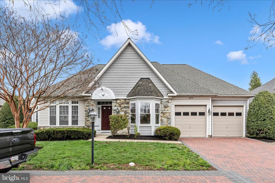 Experience elevated living in the prestigious Wormans Mill community of Frederick, Maryland. Set along a charming colonial courtyard, this impeccably maintained residence offers timeless elegance, modern comfort, and effortless convenience. Enjoy true low-maintenance living with exterior care and snow removal included. The main level features all-new flooring and fresh paint, a light-filled great room with a gas fireplace, and a beautifully updated kitchen with gas cooking, double ovens, and brand-new appliances. A sunny morning room and private porch provide inviting spaces to enjoy coffee or unwind at day’s end. The main level also offers two bedrooms plus a spacious primary suite with a recently updated luxurious bath, along with a convenient main-level laundry room. The finished lower level provides additional living space with a cozy fireplace, half bath, and abundant storage. Added peace of mind comes with a brand-new roof, and an attached two-car garage. Just steps from boutique dining, cafés, parks, and premier community amenities—including a pool, clubhouse, fitness center, courts, and scenic walking paths—this home delivers both luxury and lifestyle. All just minutes from Wegmans, major shopping, commuter routes, and historic downtown Frederick. Welcome home to elegance, convenience, and refined community living. Schedule your private tour today.