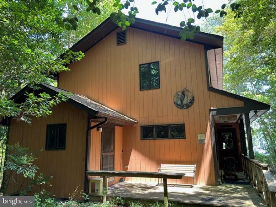 Your private waterfront oasis awaits! This 3 bedroom, 2 bath home is located on Myer Creek with direct access to  the Corrotoman River and the Rappahannock River.  Only 12 miles to the Chesapeake Bay from the dock.  Offering lots of privacy on just under 3 acres of wooded parcel.   Enjoy the convenience of being across the creek from Yankee Point Marina and upscale dining in the Black Duck Restaurant, the new "place to be" in the Northern Neck.
You will be greeted by a nicely landscaped driveway as you pull into this 2-story custom-built home on deep protected water. 
As you enter the home via the front porch you will be welcomed into a nice foyer with solid oak hardwood floors.  Continue to a big family room with a gas fireplace open to the kitchen and dining area – perfect for entertaining and cozy family gatherings.  Walk out from the dining area onto a screened porch to enjoy a beverage and the outdoors!  Connected to the porch is a spacious deck overlooking the woods and water.  (The grill conveys) Throughout the home are oversized windows – all with water or wood/trees views and ceiling fans. There is a main level bedroom across from a full bath. A second entrance on the front of the home takes you into a large mudroom with tons of storage! On the second level you will find a spacious primary ensuite with large closets.  Also on the second level is a third bedroom and a room that is ideal for an office, nursery or more storage. There are TWO electric heat pumps for this home making climate control a breeze. The septic system is a pump back system with two tanks.  Winter storm coming?  No problem!  There is a Generac generator (propane) for the entire home that will keep things running.  When the home was built, the exterior framing selected is 2x6 providing top notch insulation and sound proofing. High speed internet (fiber optic) was added in August.
Outside, there are plenty of nooks for seating, hammocks etc.  There is even a fenced in area that is ideal for pets or a child’s play area.  The deeded L-shaped dock is 120’ and has a 2,800lb capacity electric boat lift.  There is a floating dock which can accommodate dinghies, canoes or kayaks.
The 18 ft wide pull through slip at the end of the dock has six ft depth at mean low water. The dock has lighting, storage and a water spigot.  The homeowners docked several sailboats here over the years along with other smaller boats.  The weather station conveys.
Need covered space for cars and storage?  There is a 2-car stand alone carport as well as a 1,152 insulated workshop/garage with air conditioning AND a custom built 192-sf wood sided shed with an additional parking space in front.  The is also a driveway alarm sensor to provide security. 
This property has it all!  Come see it for yourself.