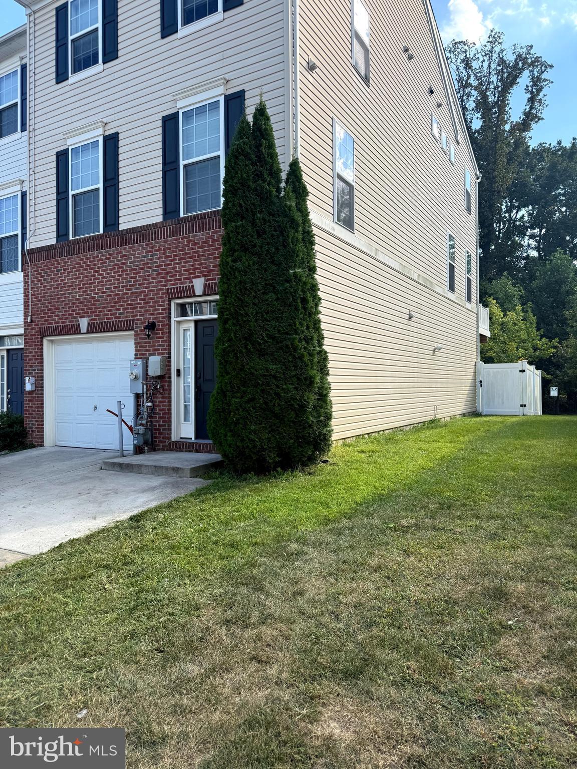 Welcome to this beautiful and spacious end-unit townhouse that offers the perfect mix of comfort and convenience. With three levels of living space, this home features 3 bedrooms, 2 full baths and 2 half baths. The huge kitchen is a standout, offering tons of space for cooking, gathering and entertaining. Just off the dining area you'll find a composite deck where you can enjoy meals or relax outside. the lower level is a walkout that leads to a fully fenced backyard, great for enjoying a little outdoor space. Upstairs, the laundry is conveniently located near the bedrooms and being an end unit, you'll love all the extra natural light. Plus easy access to major commuter routes like 32 and 295. This home offers a fantastic location and a smart functional layout. Don't mis your chance to make it yours! Good credit required with 600+ credit score and no pets