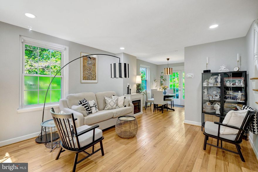 Owner's pride! One of the best maintained homes in Fairlington Village. Lovely 2 bedroom plus Den, 2 bathroom Clarendon I, End Unit located on the cul-de-sac. Light-filled main living level, accented with beautiful  natural hardwood flooring and open space. The kitchen features upgraded white cabinetry with modern hardware, granite countertops and stainless-steel appliances. Dishwasher, Stove and Microwave (2021); HVAC (2019)- has been continuesly professionally maintained twice a year. Air Ducts professionally cleaned in 2024. The upper level features two bedrooms, both with hardwood flooring; equiped closets and a full bathroom. The lower living level, can be used as a guest suite, or a rec room, plus a bonus room which can be used as an office, spare bedroom or an exercise room. Updated full bathroom with enclosed shower, washer and dryer in the lower bathroom.  the property is backing to the parkline setting, proving privacy and serene nuture. Access large balcony with RARE spiral iron staircase down to a beautiful private patio. Huge storage space in the attic which is fully insulated (very rear feature for the Fairlington units) with soaring ceilings & a window. There is plentiful parking in front of the house. Full access to Fairlington Village amenities,  swimming pools, basketball and tennis courts.  The Condo Association is responsible for the roof and all exterior elements of the house. Fairlington is a dog owner’s paradise, with plentiful parks (including nearby Shirlington dog park), even a doggy swimming day in the pools. It is also extremely cyclist-friendly, with access to DC (via Crystal City), almost entirely via Four-Mile Run and the Mt. Vernon trails. Fairlington also features excellent public transportation access, with frequent WMATA buses that connect to the Pentagon metro station, and nearby Arlington ART and Alexandria DASH bus lines. Simply Must See!