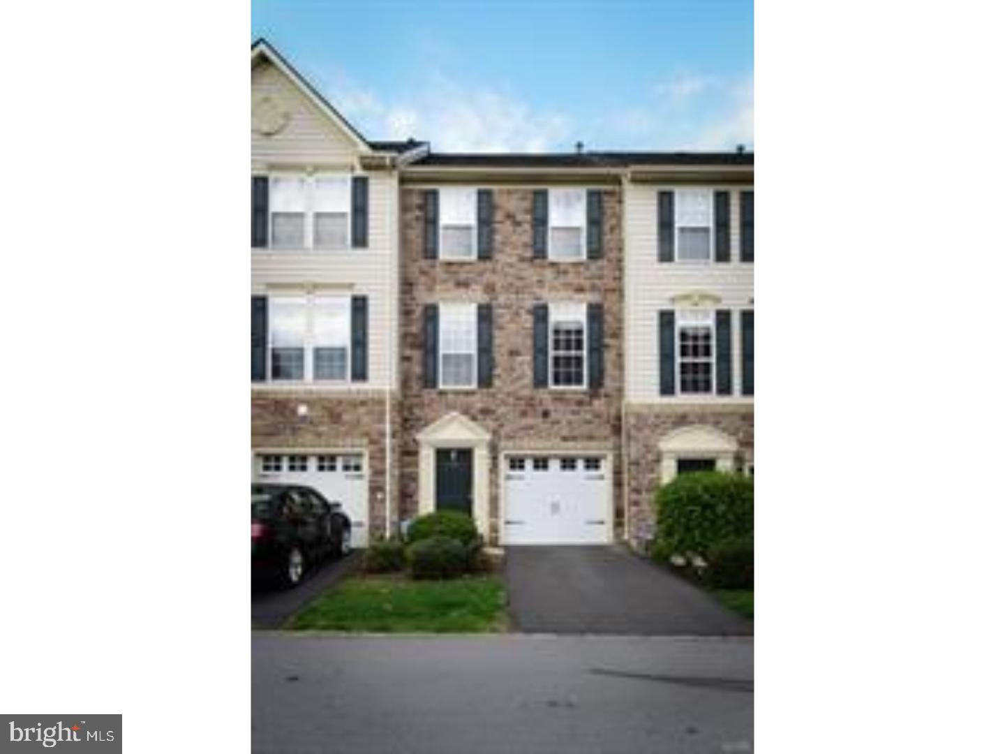 One of the largest homes in this well managed townhome/condo community. Four levels of finished living space including huge first floor family room which as patio door leading to recently installed paver patio. Main level has popular open concept floor plan with kitchen open to rear family/morning room which overlooks lush green private surroundings. Center Island kitchen with breakfast far, Corian counters and oversized cabinets is also open to dining room and living room. Entire main level has glowing hardwood floors. Upper levels feature 3 bedrooms all with private full bath with ceramic title floors. Lots of neat features in this home including hardwood entrance foyer, 9 foot ceilings on first and second floor including vaulted ceiling in kitchen/morning room, oversized windows with transom tops, full stone front, stainless steel appliances, fire sprinklers, plant shelves, and lots of crow molding and chair rail throughout. Great location, private yet easy access to Route 78