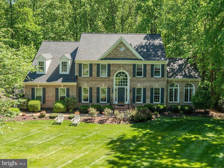 Lovely colonial with all the outdoor amenities you could imagine! ENTERTAINERS DREAM! - Pool, Screened Porch, Deck, Outdoor Kitchen, Built-in Outdoor Fireplace & Patio Plus more. 5BR/4.5BA . Walk out LL Current owners have spent close to $300,000 in upgrades and improvements! 2 Car Side Load Garage. On cul-de-sac. Private Back Yard Backing to Trees.