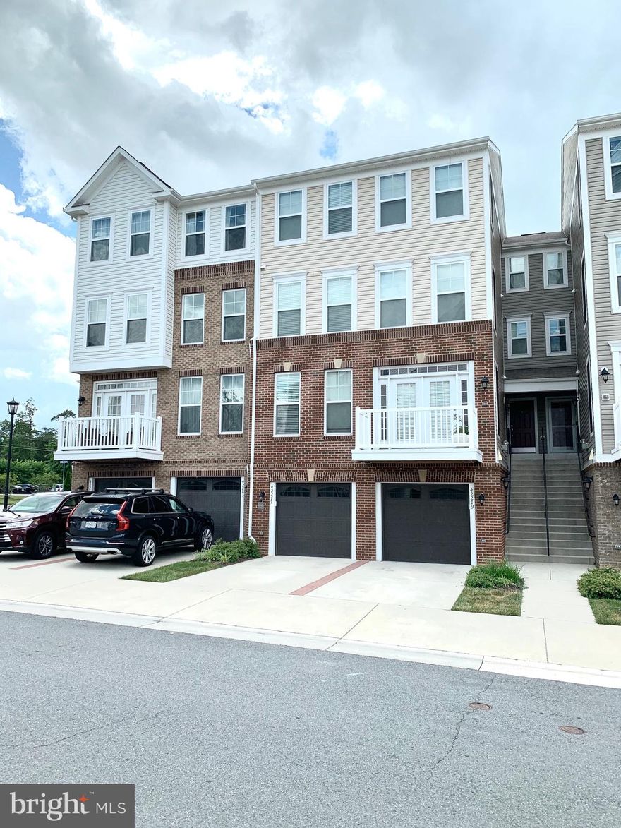 Beautiful home available in desirable Summerwalk at Stone Ridge community.  This house is a 4 level townhouse style condo  with 3 bedrooms, 2 full baths and 2 half baths.  Gleaming hardwoods in the first 2 levels.  Lower level family room boasts a full wet bar with tile back splash and glass door wall cabinets.  Main level has a formal dining area and breakfast room.  The kitchen has stainless steel appliances, granite counter tops,  and a center island with breakfast bar.  You will also find custom built in shelving in the pantry for extra storage as well as roller drawers in the under counter cabinets.  3rd level has two bedrooms with a full bath.  The owners suite is on the 4th level, with a tray ceiling, walk in closet, and an en-suite with a large soaking tub, separate walk in shower,  and double vanities.  House is equipped with a programmable 3 zone thermostat.   You will also find the laundry room with upgraded washer/dryer and custom built in counter and cabinets--a must see.  The Stone Ridge community includes 3 pools, fitness center, meeting rooms, multiple tot lots and walking trails.  Walk to the library as well as shops and restaurants.