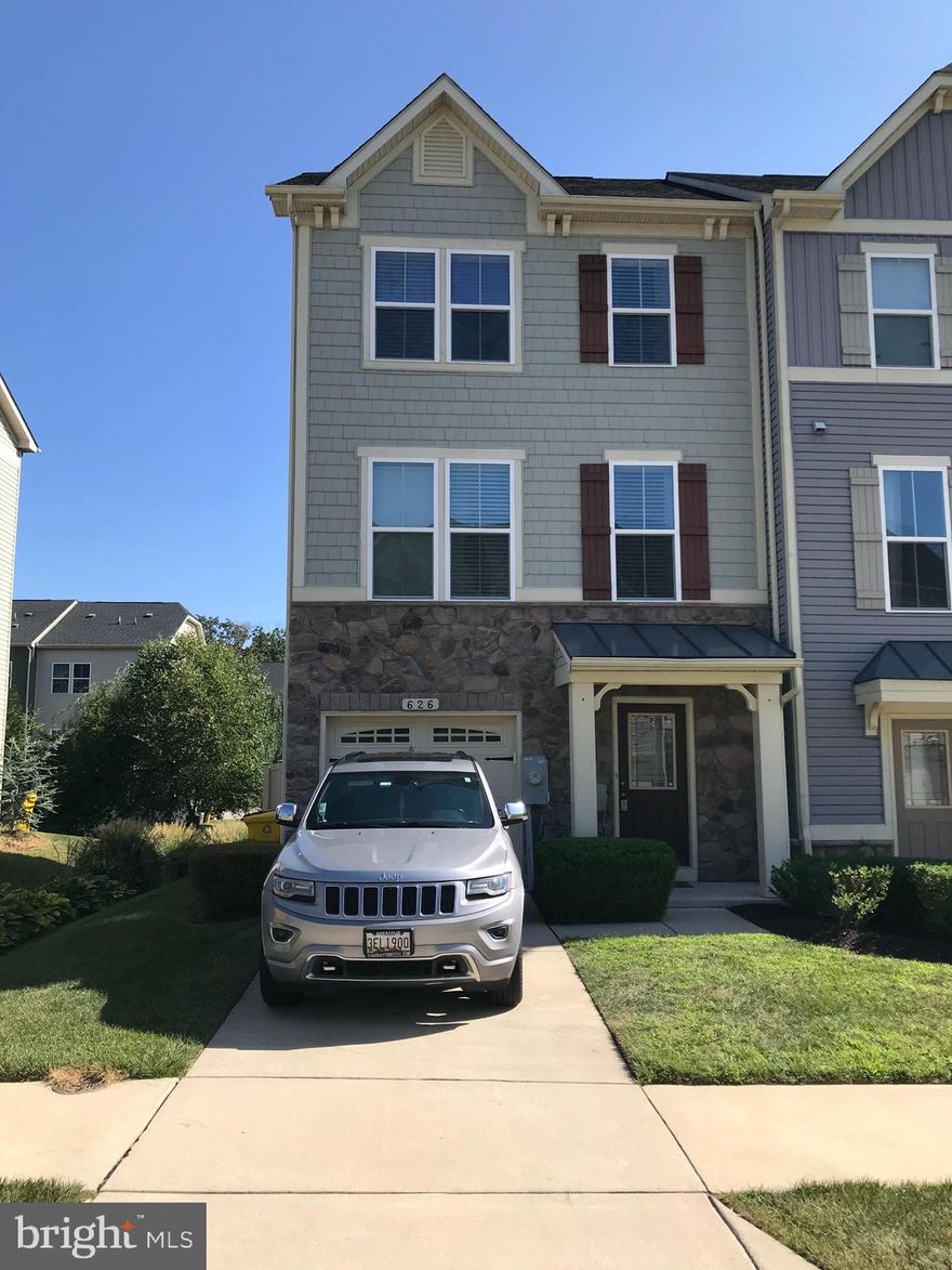 This End Unit Townhome is The Mozart Model * 3 Bedrooms, 2.5 Baths, 1 Car Garage *This Home includes Brushed Nickel Finishes* 5" Wide Plank Engineered Hardwood throughout the entire first and second floors with hardwood steps leading to the 2nd floor *Upgraded 42" Espresso Cabinets, *Granite Counter Tops *GE Stainless Steel Appliances* *Custom kitchen pendant and dining room lighting *Composite Deck (19' x 10')* Concrete outdoor patio* Fully fenced (Vinyl) backyard with side entrance gate* 2 Extra Windows for Extra Natural Light in Main Level Living Room and Lower Level Recreation Room*Upper Level Laundry *Custom trim accent walls in all 3 bedrooms *Custom accent walls and lighting in both full baths * 9' ceilings throughout * Includes full-size Samsung W&D *Love Where You Live! Creekside Village Community has Resort Style Amenities complete with a Gazebo, Clubhouse, Fitness Center, Outdoor Pool & Splash Pad, Great Room for Hosting Events plus a Dog Park* Just 3.5 Miles to I-695* BWI Airport 13 Miles* Easy commute to Baltimore, DC, Fort Meade and NSA