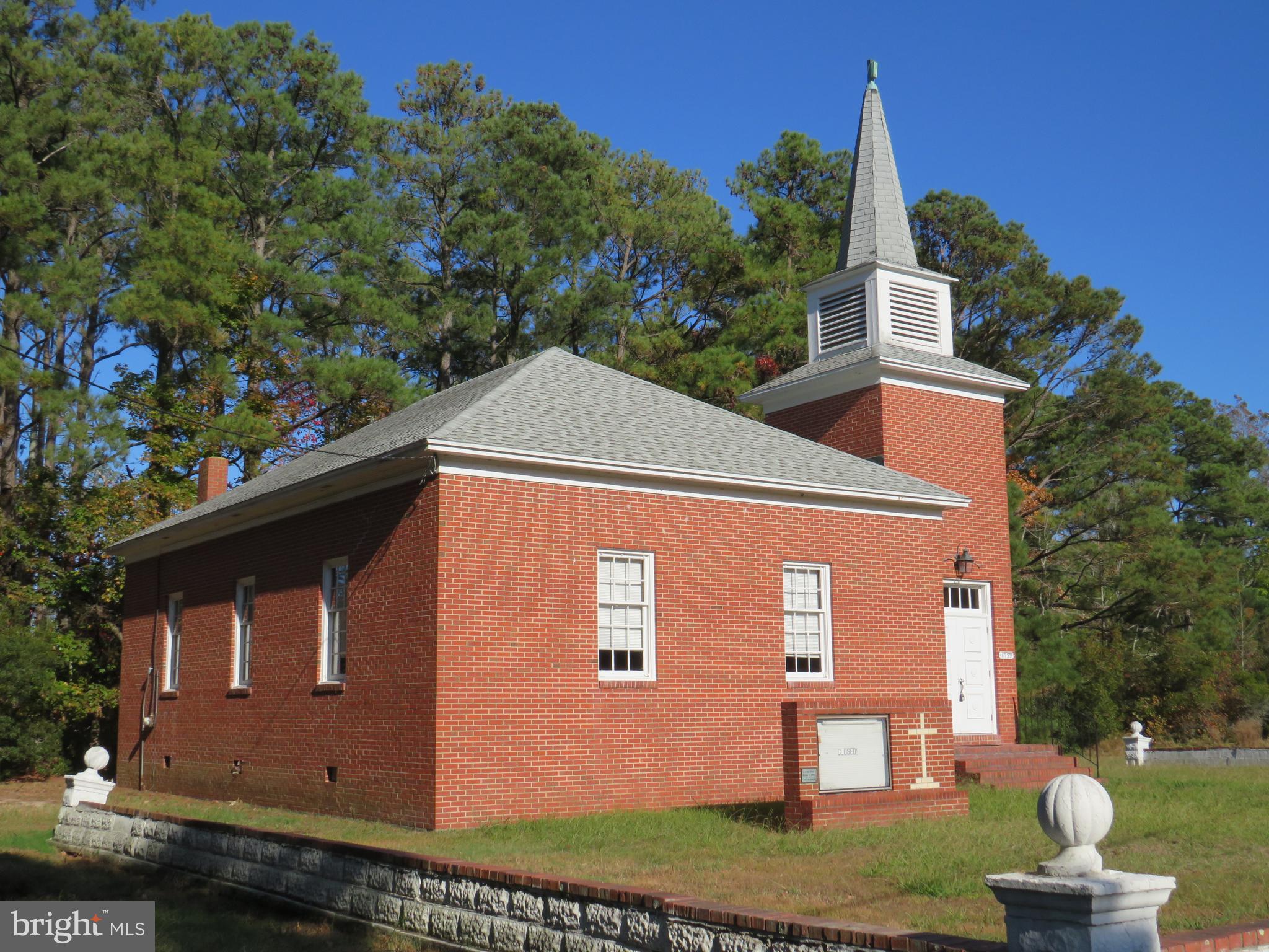 1440 sq. ft. solid brick construction church with hardwood floors, pews, HVAC system, oil furnace, central air. Additional lot included, Pcl 253, .75 acres, for a total of 2.25 acres. This building has a vestibule, sanctuary and a rear furnace room. There is no well or septic, no bathroom. Building is in very good condition. Property is purchased "as is". There is a church cemetery. Maryland law requires owners to allow visitation by relatives by appointment and convenience. 2025 Site evaluation for septic system did not pass.