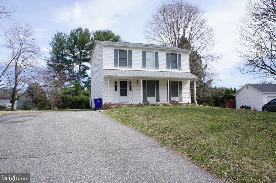 Unlock your next adventure! Behind these doors awaits a world of comfort and charm. Make this house your sanctuary a true welcome home!  This single-family residence is located in a tranquil neighborhood on a half-acre of land, featuring 3 bedrooms and 2.5 bathrooms and a wonderfully large living space. This home has New Luxury Vinyl flooring  throughout, as well as a recently renovated kitchen and formal living and dining rooms provide an open feel. Off the kitchen, you will find a cozy screened-in porch; the perfect place to sit, relax, and enjoy your morning coffee! Currently situated in the desirable, sought-after, and highly rated Centennial High and Ellicott Mills Middle Schools district. With the close proximity to great shopping and dining, you will have an abundance of entertainment options. This ideal location has easy access to Routes 29, 70, and 100.  Additionally, the home has a large driveway with ample off-street parking. Hurry, don't let this one get away!!