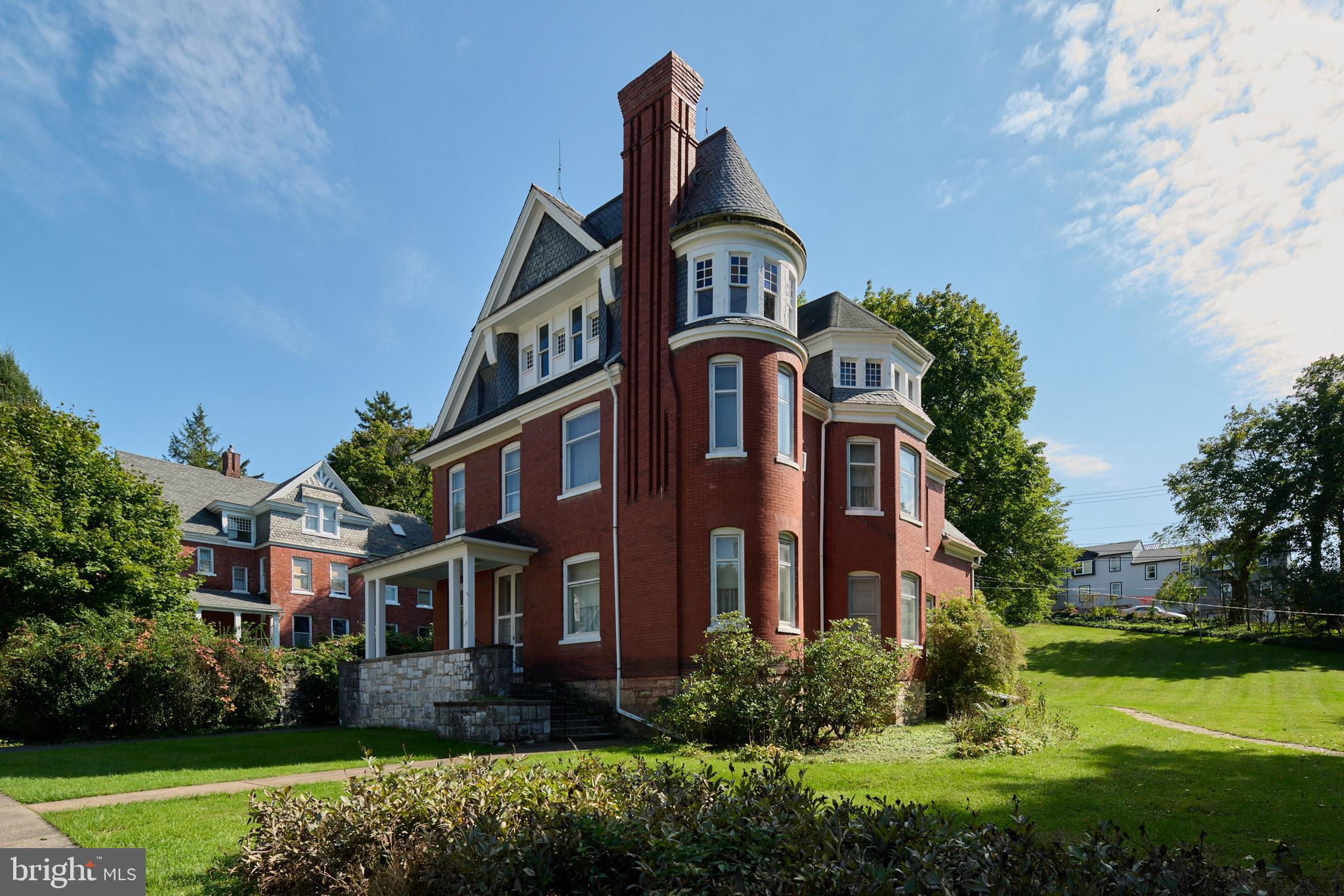 Discover the Victorian charm and beauty as yesteryear's nostalgia blends with some of today's modern kitchen and bath conveniences in this 3-story, 1890 built, stately brick and stone Queen Anne Victorian. The home has currently been in the same family for 79 years but was originally built for Bank President C. F. Montgomery and architecturally designed by famous Architect Samuel Fox. Check out the write up on the house described as "A BEAUTIFUL HOME, THE HANDSOME DWELLING HOUSE ERECTED BY C. F. MONTGOMERY" in the Keystone Gazette dated Friday, August 21, 1891, attached separately under documents. Site selection was important and none better than desirable Linn Street close to downtown in the beautiful downtown Historic District, close to Spring Creek, Talleyrand Park, and 20 minutes from Penn State University. Containing 14 rooms, 8 Bedrooms, 4.5 Baths on over a half-acre of land with off street parking and priced at a fraction of the reproduction cost. Think of how you can spread out for your next gathering when entertaining family and friends on holidays and football weekends. Investors may have different ideas.
The current owner has updated the kitchen with granite counter tops, Viking Professional gas range & hood, Frigidaire refrigerator, & Whirlpool dishwasher while utilizing the abundant storage space in the Butler's Pantry and elsewhere.
Additional features include: Jetted whirlpool tub & clawfoot soaking tub, beautiful chandeliers, including a Murano chandelier, many beautiful stained glass windows throughout, 2 large floor to ceiling decorative wall mirrors, multiple fireplaces, Burnham Commercial Boiler, 2nd floor laundry room, Culligan water softener, Casablanca ceiling fans, Gas Hydrojet total performance water heater, 2nd floor outdoor (Sleeping) porch, and many Stained glass windows.
Uniquely charming and ready for you to call it home.