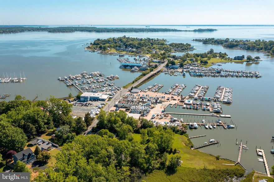 Finally, you found it!  A beautiful home with awesome waterviews for under 1 million.  Located in the desirable Island community of Turkey Point, this large beautiful home has WATERVIEWS from every room.  Quality 2' X 6' construction is part of this 5500 sq ft brick home that has 4 levels.  Spacious kitchen with double wall oven, granite island and breakfast room.  Large step down family room has floor to ceiling stone fireplace.  Third level can be au pair suite,  in law suite or get rid of your teens for the weekend room.  Large basement for entertaining also has a room with a closet that can be used as a 6th bedroom.  There is also unfinished space for storage and 2 zone heat with oil backup.  Enjoy the Island Life with great views from  your deck, with 3 Natural community beaches, fishing pier and playground. Convenient to Annapolis, DC and Baltimore.