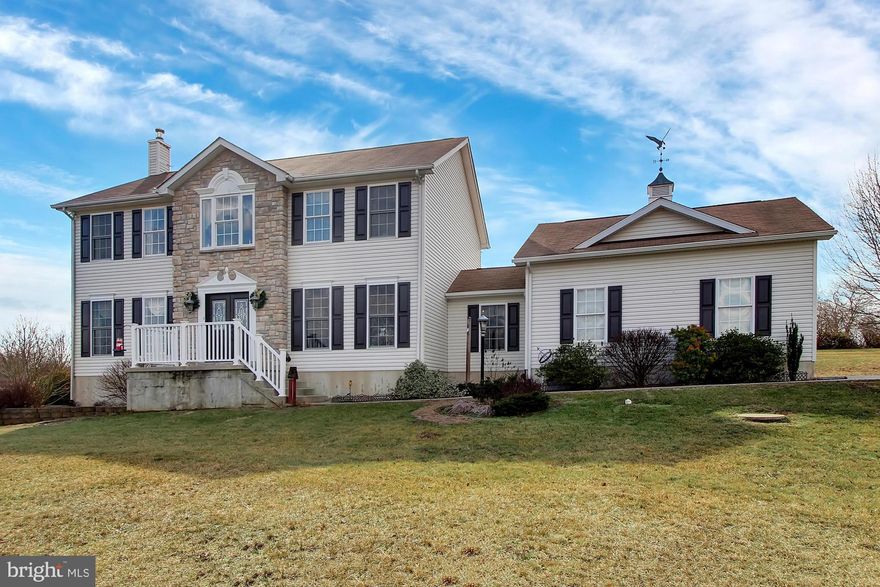 Oversize 2 car gar w/propane heater; New Gar Doors & Openers; New lead glass double front door; repainted shutters & moulding on exterior front; new washer & dryer in laundry rm; SS smooth top range, refrig, built in microwave & dishwasher in kit. HDWD Flrs in foyer, hall, dining rm & stairs. Master bath w/double vanity. Lge formal dining rm w/wainscoting & crown molding. School bus stops in front