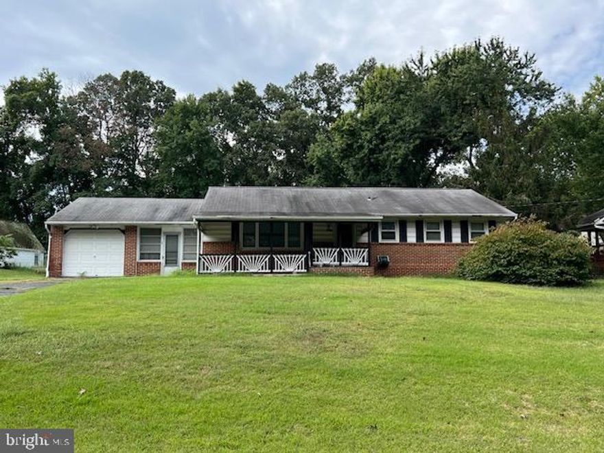 Fantastic opportunity to own a single family home  in a water privileged neighborhood with a boat ramp.  1260 living sq. feet, 3 large bedrooms, 1 full bath, 1 car garage and a nice sized shed in back yard.  Kitchen cabinets are in great shape and the hardwood floors are in pretty good condition as they have been covered with carpet for a long time.   This home is an Estate Sale and being Sold As IS.  Home needs work but has great potential.  PR just invested $6,000 for HVAC.  Buyer to perform due diligence regarding home and property.