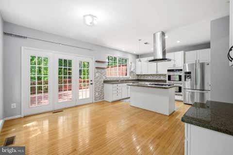 Photo of 4601 Buckhorn Ridge, FAIRFAX, VA 22030 (MLS # VAFX2323500)