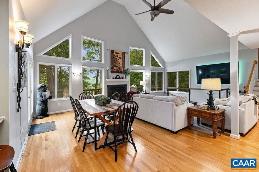 This home is absolutely pristine! Walk just a few steps from your driveway to the trail leading right out to the Tyro slope. New remote controlled gas log insert, radon mitigation system, security system, new gutters & guards and PVC band board around deck. Featuring a large deck and with views across to the Ridge with swings located below in a beautifully landscaped area. Driveway is paved with parking close to the front door and only a couple of steps to the porch. Main level living with two bedrooms and two baths on the main level. Upstairs boasts a private Owner's Suite and an additional flex room that can be a study or overflow sleeping area. Situated on a completely finished walk out basement.,Granite Counter,Wood Cabinets,Fireplace in Great Room