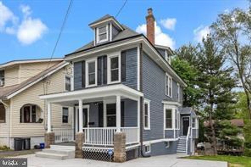 Beautifully renovated 3 Bedrooms & 2 ½ Baths with open floor plan that has to be seen!! Entering from the front porch with Trex flooring and Vinyl railing,  through gorgeous oval glass entry door into large open floor plan  living /family room and immediately be impressed by the brand new kitchen with water proof flooring and custom ready for flat screen TV/electric Fireplace setup. Kitchen has been redesigned and features recessed lighting, 36" white shaker cabinets with soft close doors, tile back splash, granite counter tops, drop in stainless sink with pullout faucet and garbage disposal. Samsung Stainless steel appliance package includes side by side door refrigerator with ice maker, gas cook top range, built in microwave and dishwasher. Built-in breakfast bar with electric outlet features granite counter top, french patio door leading to rear deck. Living room has been updated and features water proof flooring, recessed lighting and ceiling fan, redesigned floor to ceiling built-in flat screen tv / electric fire place setup with faux stacked stone, living room accented by trim package which features crown molding, chair rail, shadow box and oversized base molding. The added dining area off of living room features water proof flooring, half bath with ceramic tile floor. Second floor features hall bath, one bedroom and Master Bedroom Suite with a beautiful, modern main bathroom, and over-sized tile shower. Third floor features over-sized bedroom with walk in closet. Also partially walkout basement has a laundry. Exterior features newer concrete sidewalk and newer concrete drive way and rear concrete patio with lower level stairs in to large yard. Extras include fresh paint throughout, newer high efficiency gas fire furnace with central air, 200 Amp electrical circuit breaker system, newer gas hot water heater. 3rd floor bedroom features new mini split HVAC system. This home is conveniently located close to a community park, schools, major roads, train station and shopping.