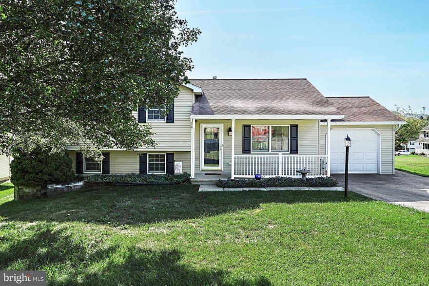 Must see!  This adorable split level has just been updated!  Fresh paint and new carpeting throughout, full bath on lower level, remodeled bath upstairs, new Wi-Fi ready thermostat.  All 3 bedrooms feature brand new ceiling fans.  Lower level family room is spacious yet cozy.  Laundry room is finished with easy access to the basement storage space.   Large deck off kitchen is the perfect space for grilling out, or enjoying the cool fall evenings.  Mature landscaping and tons of room for outdoor family activities!  Make this home yours today!