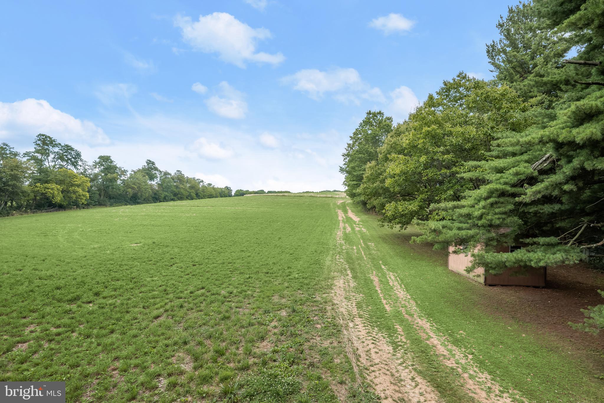 NEW- THERE IS A BUILDING ENVELOPE -Introducing an exceptional farming opportunity within the 4800 Block of Turkeyfoot Road in Westminster. This expansive rural setting on 48 acres is a perfect mix of open fields for extensive farming or raising farm animals with the wooded areas along the perimeter edges offering privacy from adjacent properties. Located in the center of the farm field is a treed area where the land owner could meditate while looking towards the breathtaking views of the Blue Ridge mountains. The property is currently being farmed and is in the MALPF Program and receives the benefit of the reduction in land taxes. Call for an appointment to see this beautiful farm property. No Access can be provided without an appointment.