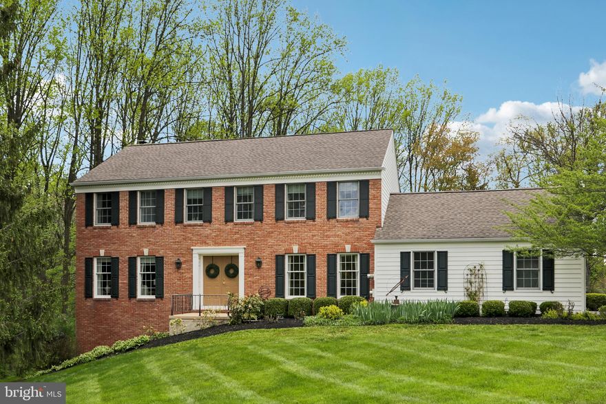 Professional photos coming next week. Welcome to this beautifully maintained 2-story brick Colonial on a private cul-de-sac lot overlooking the woods, featuring multi-level decks and a covered screened porch with skylights. This 4-bedroom, 2.5-bath home is just waiting for its new owner to move right in. This home has been lovingly maintained and thoughtfully updated with newer HVAC (2021), hot water heater (2022), well tank (2019), a newer roof, newer windows, an updated primary bathroom, and stainless steel appliances. Hardwood flooring welcomes you into the home and continues through the elegant dining room, kitchen, breakfast room, powder room, and laundry room. The sun beams into the front living room with warm finishes, and the family room—with its wood-burning fireplace and brick hearth—truly makes this house feel like home. The family room leads out to the screened-in porch and multi level decks, where you can spend countless evenings enjoying the sunset and taking in all that nature has to offer. The second floor features a light and spacious primary suite with a walk-in closet, makeup area, and updated primary bath with a walk-in shower. It also offers three additional generously sized bedrooms, a linen closet, and a hall bath with a double vanity and tub/shower. If you need more space for crafts, a pool table, or a second family room, the walkout lower level has it all—complete with an additional fireplace, plus an unfinished area with abundant built-in storage and room for a workshop. There is also plenty of space to enjoy outdoor activities in the large, flat front and backyard, along with a long driveway and cul-de-sac perfect for biking, basketball, and neighborhood fun. Showings will begin next Thursday afternoon.