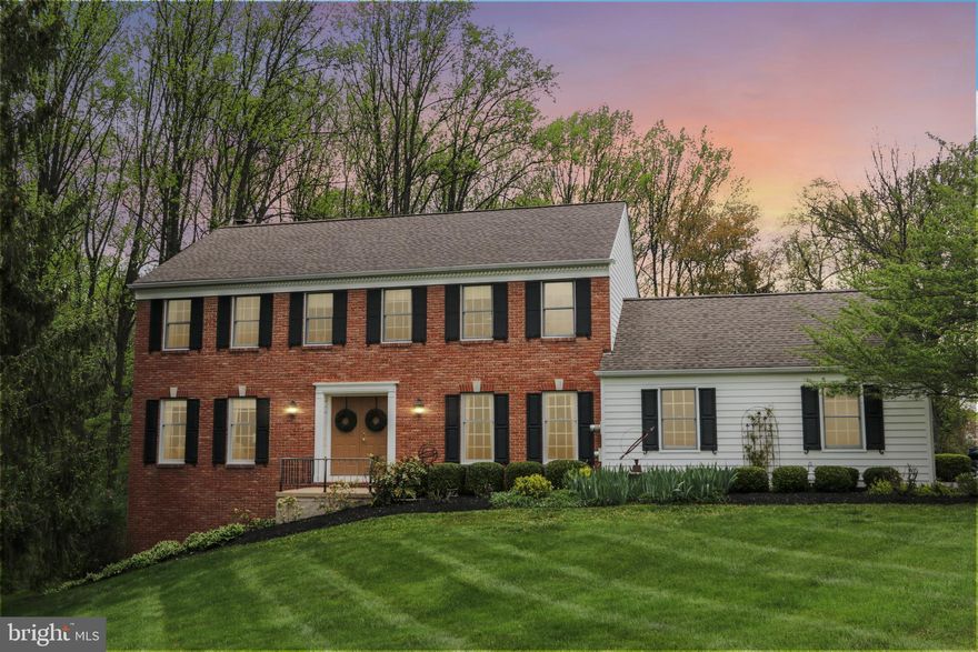 Professional photos coming next week. Welcome to this beautifully maintained 2-story brick Colonial on a private cul-de-sac lot overlooking the woods, featuring multi-level decks and a covered screened porch with skylights. This 4-bedroom, 2.5-bath home is just waiting for its new owner to move right in. This home has been lovingly maintained and thoughtfully updated with newer HVAC (2021), hot water heater (2022), well tank (2019), a newer roof, newer windows, an updated primary bathroom, and stainless steel appliances. Hardwood flooring welcomes you into the home and continues through the elegant dining room, kitchen, breakfast room, powder room, and laundry room. The sun beams into the front living room with warm finishes, and the family room—with its wood-burning fireplace and brick hearth—truly makes this house feel like home. The family room leads out to the screened-in porch and multi level decks, where you can spend countless evenings enjoying the sunset and taking in all that nature has to offer. The second floor features a light and spacious primary suite with a walk-in closet, makeup area, and updated primary bath with a walk-in shower. It also offers three additional generously sized bedrooms, a linen closet, and a hall bath with a double vanity and tub/shower. If you need more space for crafts, a pool table, or a second family room, the walkout lower level has it all—complete with an additional fireplace, plus an unfinished area with abundant built-in storage and room for a workshop. There is also plenty of space to enjoy outdoor activities in the large, flat front and backyard, along with a long driveway and cul-de-sac perfect for biking, basketball, and neighborhood fun. Showings will begin next Thursday afternoon.