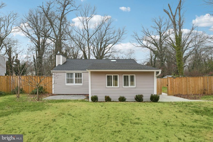 OPEN Sunday, 2/15/26, from 2-4 PM.....This "home sweet home" is now priced to move...WOW....Completely renovated and ready to impress! The stylish kitchen is a chef’s dream, featuring smart appliances, quartz countertops, custom cabinetry, a chic backsplash, and a spacious pantry. Luxury vinyl plank flooring flows throughout the home, enhanced by recessed lighting and an electric fireplace, creating a cozy, tech-savvy atmosphere. A centrally located skylight fills the space with streams of natural light.
The primary bedroom offers a peaceful retreat with ample closet space. The spa-inspired bathroom features a waterfall shower designed for ultimate relaxation.
The fully fenced backyard backs to a quiet, wooded lot, offering privacy and tranquility. Enjoy outdoor living on the porcelain-tile front patio or the concrete rear patio—both perfect for relaxing or entertaining. Two sheds provide additional storage, while updated landscaping and flower beds add charm and curb appeal. An oversized driveway accommodates multiple vehicles.
Conveniently located just steps from the elementary school and minutes from Mount Vernon High School, with easy access to Richmond Highway, Route 1, and Fort Belvoir. Shops, grocery stores, and dining are nearby, making everyday errands a breeze.
This move-in-ready home combines modern updates with timeless features, offering privacy and convenience in one perfect package. Don’t miss the opportunity to call this gem your new home!