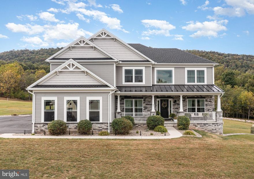 Welcome to 47 Warren Trail, Fairfield:  A custom-built, one-owner Colonial with quality upgrades throughout. Built in 2020, this thoughtfully designed home features 4 bedrooms, 2.5 baths and a layout tailored to modern living. Perched on a picturesque two-acre corner lot in a sought-after section of Jacks Mountain, the property is surrounded by other impressive homes and scenic mountain views. Exterior highlights include a paved driveway with hardwired lighting and entry columns, a heated three-car garage with electric vehicle charging capabilities, and ample outdoor space for recreation. A spacious Trex deck with built-in lighting provides the perfect setting for entertaining & relaxation. Inside, enjoy an impressive two-story foyer, open staircase with wrought-iron spindles, oak hardwood floors with espresso finish, and custom details like chair railings, crown molding, and tray ceilings. The upgraded kitchen features beautiful white cabinetry, quartz countertops, GE Monogram appliances, a professional side-by-side Frigidaire refrigerator/freezer, gas cooktop with pot filler, wine and coffee bar, and a breakfast room with vaulted ceilings. The primary suite offers double-door entry, a walk-in closet, and a spacious bath with soaking tub, tile shower, and double vanities. A large unfinished walk-out basement with a rough-in provides abundant storage and the potential for future living space. Additional features include dual-zone heating and cooling and a gas fireplace. Centrally located- just minutes from Liberty Mountain Resort, Historic Gettysburg, multiple golf courses, the PA/MD line, and so much more!