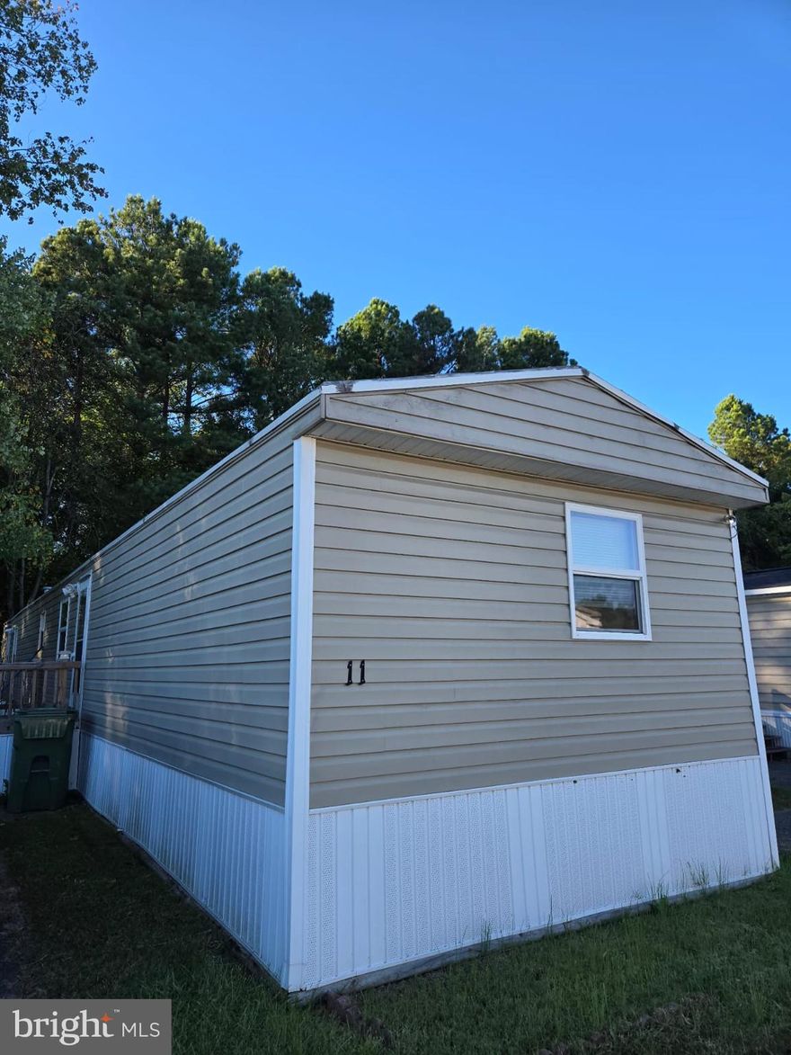 Welcome to this charming 3 bedroom, 2 bath single wide home located on leased land ($900/month) in Foxwood Village, right in the heart of Stafford. Just minutes from I-95, shopping centers, schools, and Quantico, you'll love the convenience this location offers. The community features sidewalks, a playground perfect for families and is pet friendly too. Inside, the home includes a cozy wood-burning fireplace, ideal for curling up on chilly days with a warm drink and a good book. So come on over and make an offer!