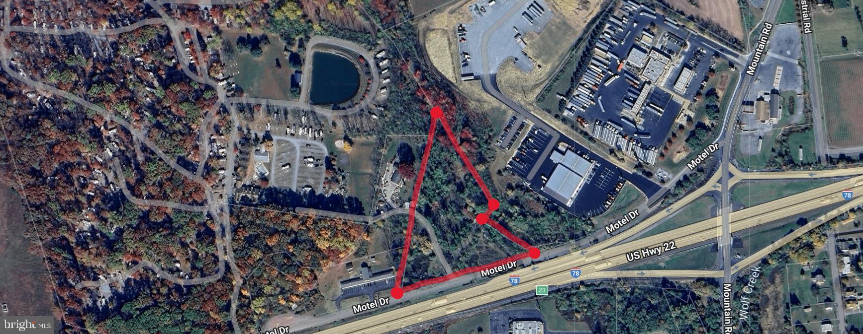 Prime highway commercial location in Shartlesville, Berks County PA. Highest and best use is redevelopment for uses withing the HC zoning guidelines. 4.49 acres with over 700 feet of road frontage facing Rt. 78 with daily traffic count of over 33,000. Wide range of allowable uses -Public sewer line currently runs through the property. Contact listing agent for specific zoning information. Located nearby is Appalachian Campgrounds, Kenworth Trucks, Love's Truck Stop and Dunkin'.