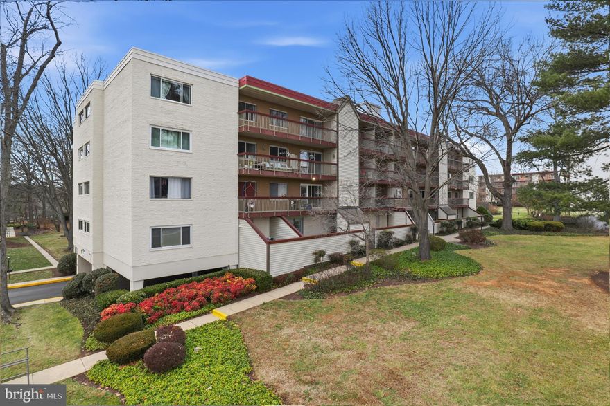 Welcome to West Spring Condominiums, where comfort, convenience, and style meet in this beautifully updated top-floor 2BR, 1BA home. Enjoy a bright, open layout with newer neutral LVP hardwood floors, large windows, and tasteful modern updates. The renovated bath features marble tile, a floating vanity, and elegant finishes. The kitchen boasts newer countertops, gas cooking, and newer appliances. Step onto your private balcony overlooking the pool and landscaped grounds, or greet the day from your window overlooking the Juliet balcony off the primary bedroom with its walk-in closet. The second bedroom offers even more storage. Condo fee includes all utilities! Furniture in the condo may convey if you'd like. Community amenities: pool, picnic area, dog play area, walking paths, and more. Includes deeded garage space (#69) plus guest parking. Unbeatable Bethesda location—across from Westfield Montgomery Mall, near Cabin John Park, NIH, and major commuter routes. Light, space, updates, and convenience—all here for you!