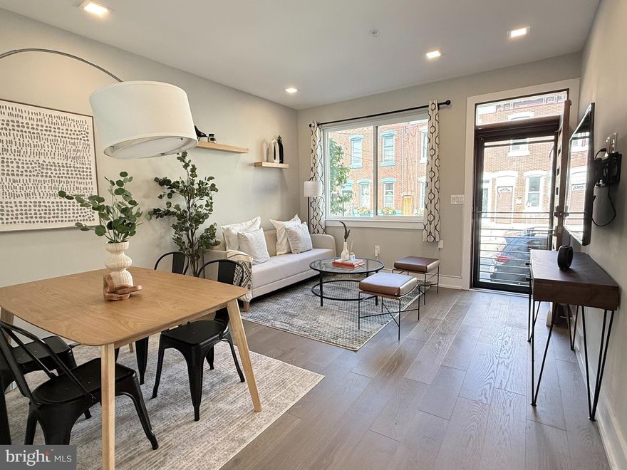 Move in ready in the heart of Fishtown! 2015 Tulip is a stunning home located steps from Frankford Ave and Konrad Square Park on a quiet residential block in the heart of Philly’s trendiest neighborhood. Completed in 2019, this spacious 3 bedroom, 3 bathroom home also features a finished basement and private roof deck. No detail has been overlooked in this modern, impeccably maintained property. Upon entering, you’re greeted with a modern wood front door, large windows, soaring ceilings, a fresh paint job and a flexible living/dining layout. The sunny kitchen has plenty of storage and prep space, a farmhouse sink and a stylish glass tile backsplash. The kitchen has clear sight lines to the living room and offers easy access to the cheery patio through a glass panel door. Room for gardening and grilling right off the kitchen! Continue upstairs to explore 2 spacious bedrooms flooded with natural light through the oversized windows and each with large closets. This floor also includes a generous full bathroom with designer tile, a bathtub and a large vanity. The sun drenched primary suite is located on the third floor which also features a bathroom with double sinks and a massive glass enclosed shower as well as a separate laundry closet with storage and a stacked, full-size washer and dryer. Ascend to the fourth floor to access a lovely roof deck boasting skyline and treetop views. The full footprint finished basement adds incredibly usable square footage and has another full bathroom, tall ceilings, good light and offers even more space for hobbies, fitness, work from home, movie nights etc. Pride of ownership is apparent in every aspect of this beautiful home and you’ll enjoy 4 more years of lower property taxes with the tax abatement (abatement ends 6/30/29). Enjoy the walkability and bike-ability of Fishtown and a convenient commute to center city via public transit. Or stay closer to home with Riverwards Produce, Tulip Pasta & Wine Bar, Amy’s Pastelillos and Reanimator Coffee all right around the corner. Don’t miss your opportunity to live in the heart of it all!